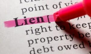 selling a house with a lien California